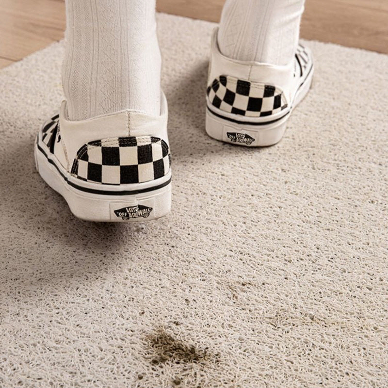 Scrapes off dirt front door mat